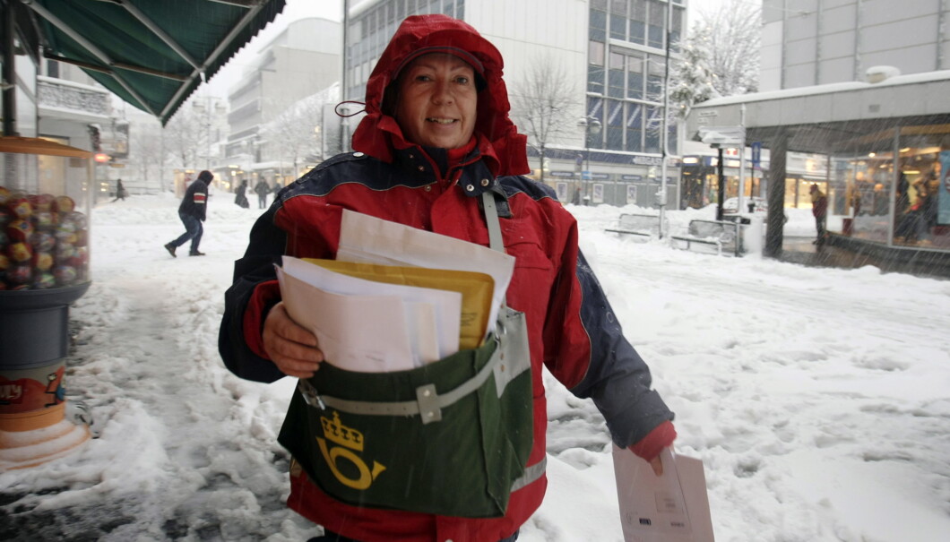 KRISTIANSAND 20080105:
Posten skal frem selv om det snør.
Foto Tor Erik Schrøder / SCANPIX . KRISTIANSAND 20080105:
Posten skal frem selv om det snør.
Foto Tor Erik Schrøder / SCANPIX .
